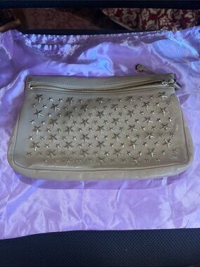 Jimmy Choo studded clutch..like new with authentication cards.